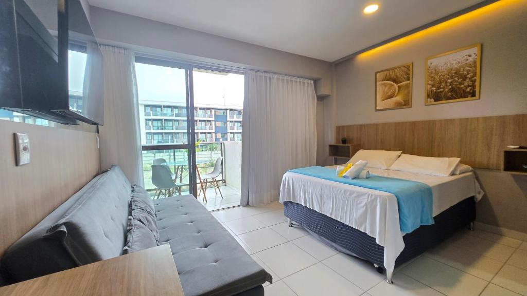 En eller flere senge i et værelse på Flat Mana Muro Alto