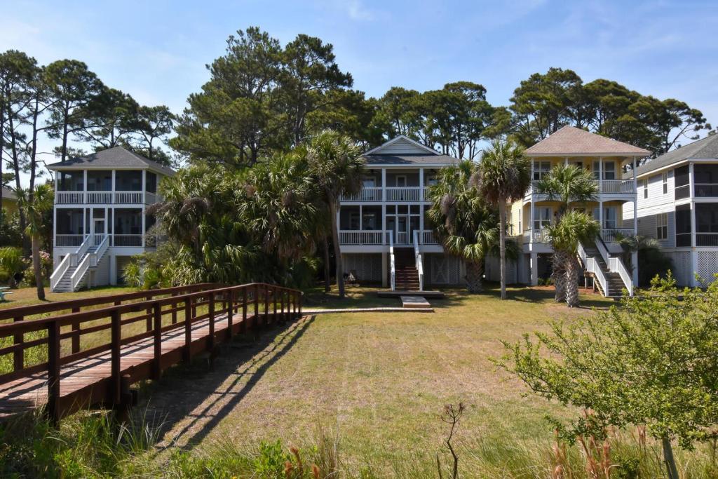 an image of a house with a fence at Spacious 4-Bed, 4-Bath Home in the heart of Fripp Island in Fripp Island