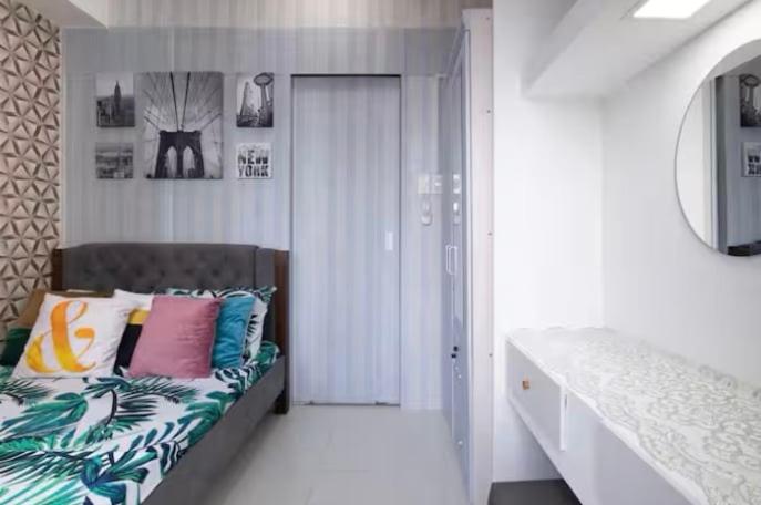 Katil atau katil-katil dalam bilik di Cozy Staycation at Green Residences