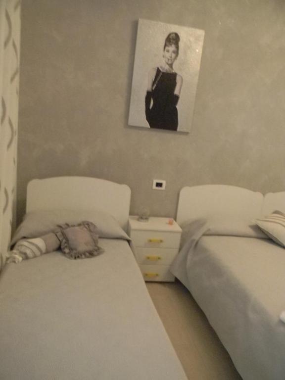 Postel nebo postele na pokoji v ubytování B&B Giorgio La Pira