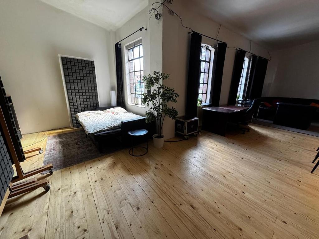Ένα ή περισσότερα κρεβάτια σε δωμάτιο στο Exclusive studio in Ostrava