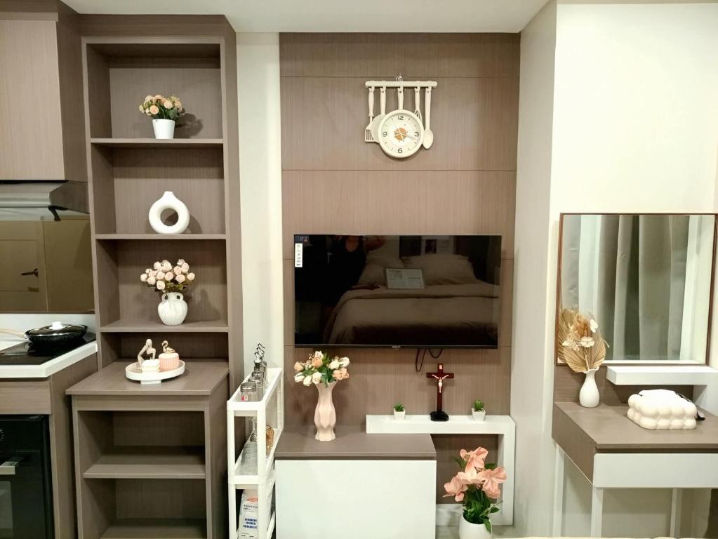 a model of a bedroom with a sink and a clock at Le Menda Residences - Majestic Heights in Cebu City