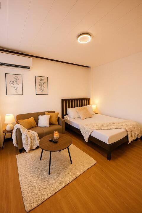 Кровать или кровати в номере Balai de Biday 4 Pax Suite with Free Breakfast