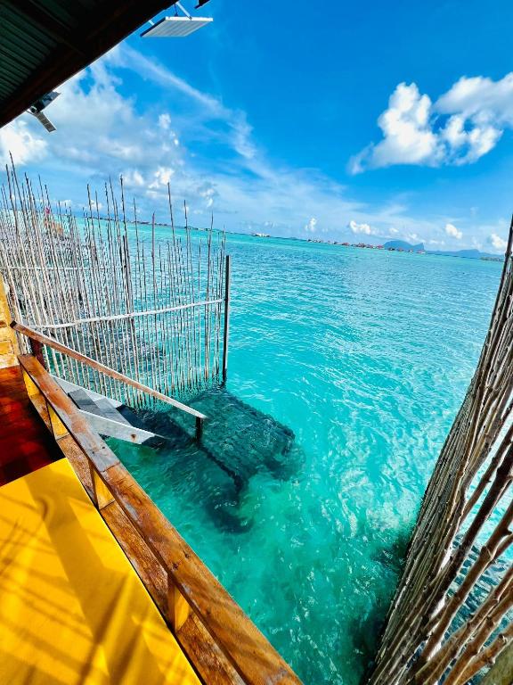 a view of the ocean from the bow of a boat at Nusakuya Resort in Semporna