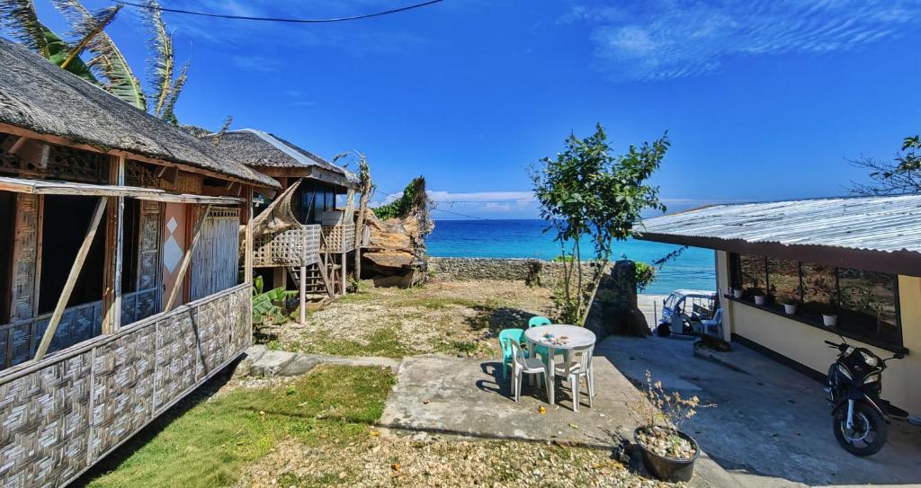 a house with a view of the ocean at Truth be Found Ministry Resort in Jagna