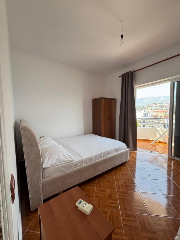 Ένα ή περισσότερα κρεβάτια σε δωμάτιο στο Coastal Bliss Apartment