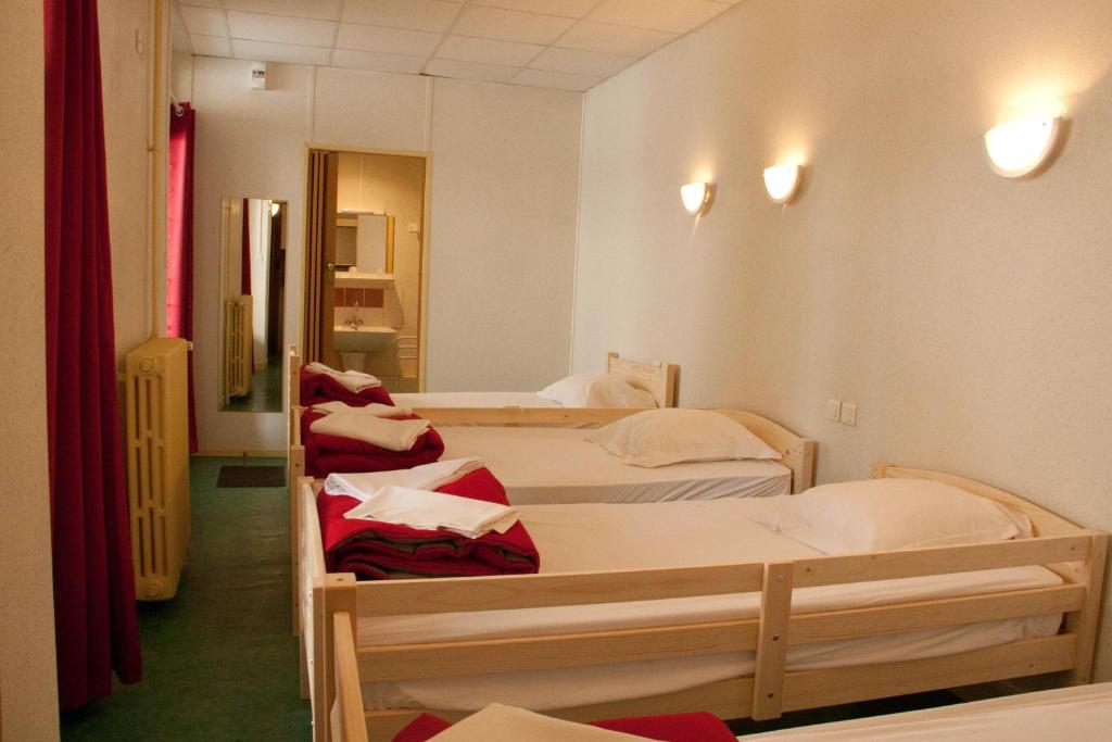 Postel nebo postele na pokoji v ubytování Hébergement Artense