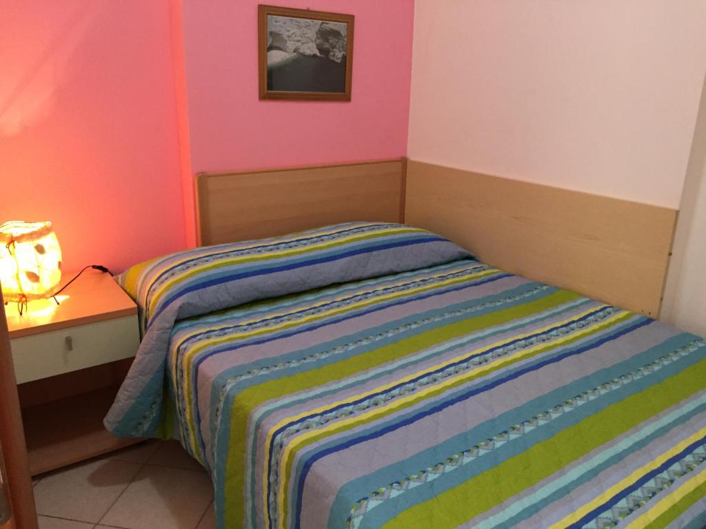 Łóżko lub łóżka w pokoju w obiekcie Villa Marilena