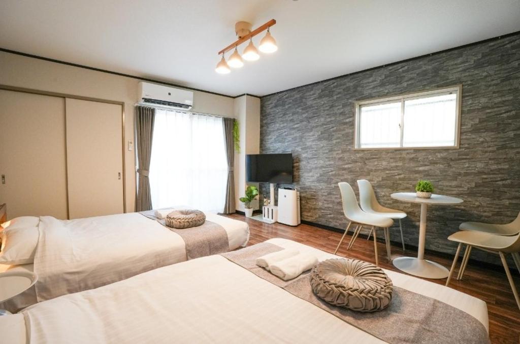 Guest House YOTSUBA 最高の立地,徒歩すぐ黒門市場,難波,道頓堀,日本橋近く