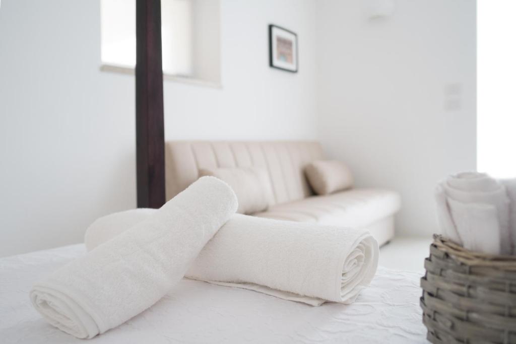 Postel nebo postele na pokoji v ubytování Fikus - the Apulian B&B
