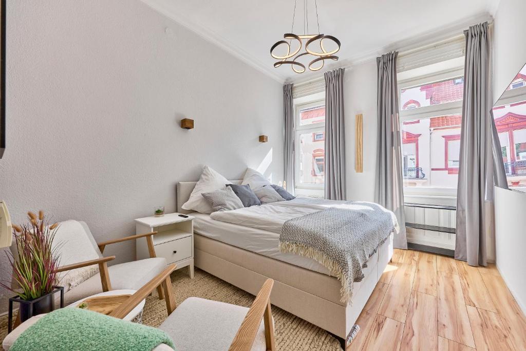 En eller flere senge i et værelse på KL-City - Terrasse & Barista