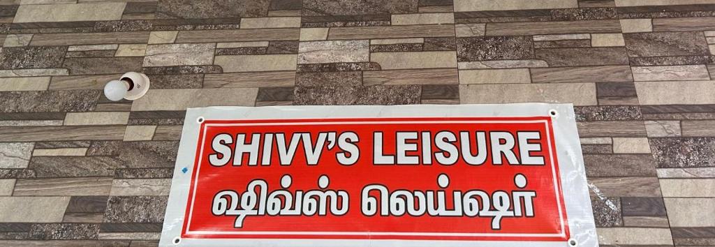 Shivv's Leisureに飾ってある許可証、賞状、看板またはその他の書類