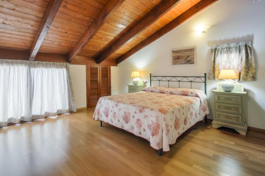 A bed or beds in a room at Quarté Sayàl