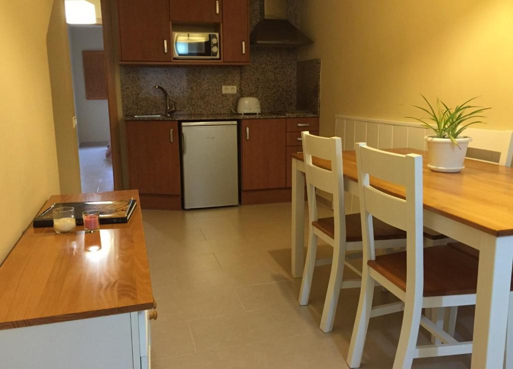 Kuchyň nebo kuchyňský kout v ubytování Apartament Escaladei