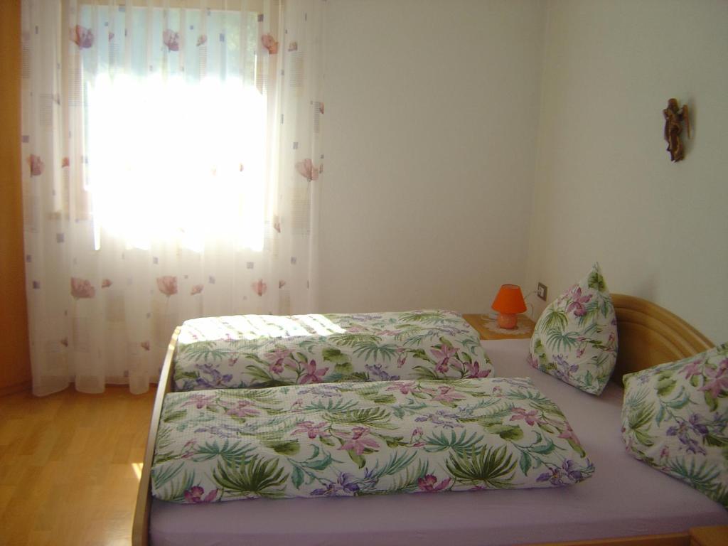 Postel nebo postele na pokoji v ubytování Appartements Oberleiter