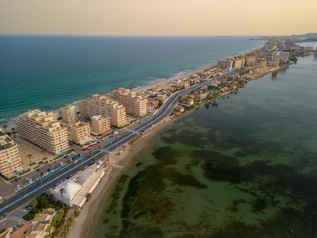 an aerial view of a city next to the ocean at Hawaii V 25B - La Manga By WATERMELON in La Manga del Mar Menor
