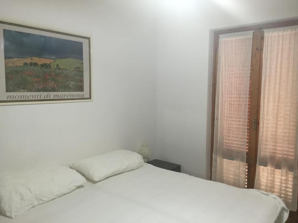 Postel nebo postele na pokoji v ubytování Il Gamberetto