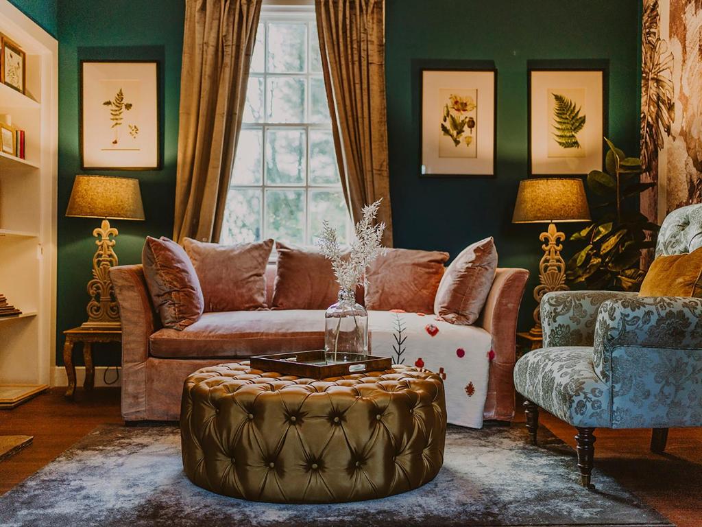 a living room with a couch and a table at Rose Blair Lodge - Uk31045 in Portpatrick