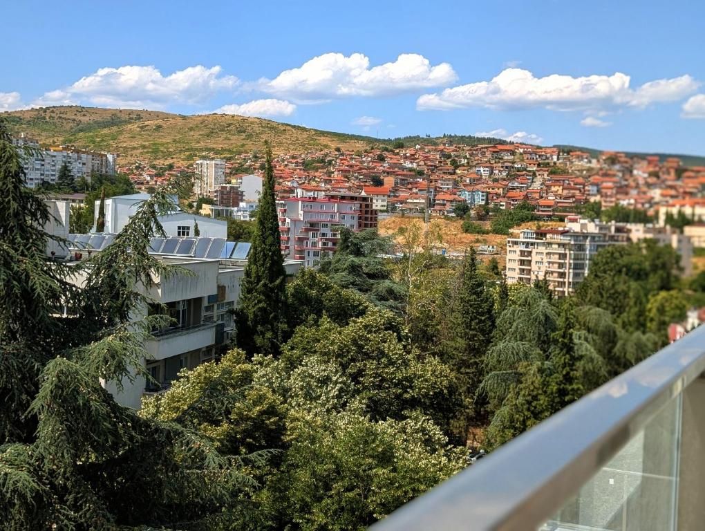 a view of a city from a balcony at Panorama Sunset Studio in Stara Zagora