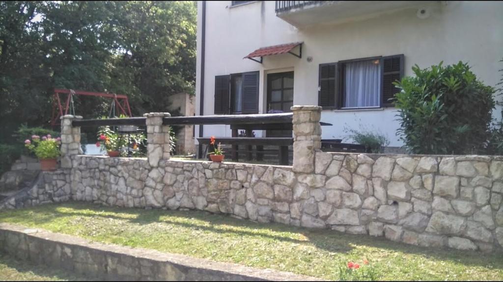 Vonkajšia záhrada v ubytovaní Apartments Kalac