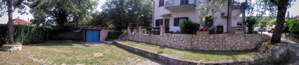 Vonkajšia záhrada v ubytovaní Apartments Kalac