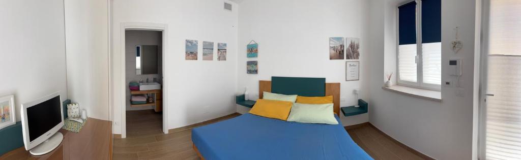 Giường trong phòng chung tại Spirito Santo