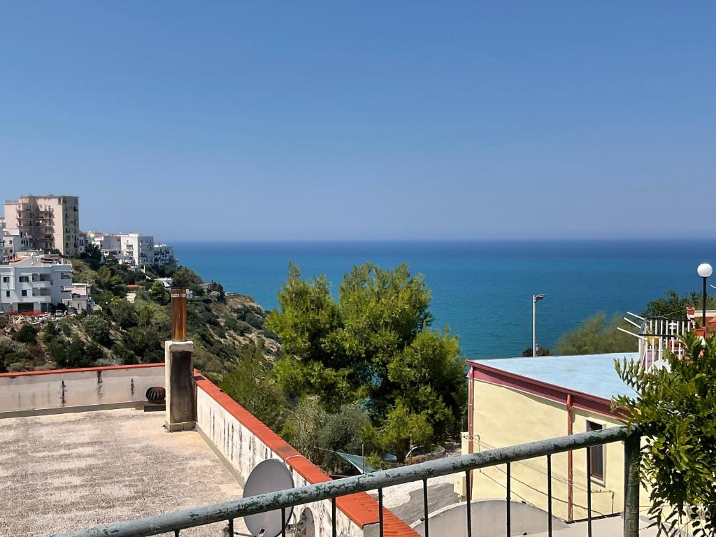 a view of the ocean from a balcony at Casa Sundaville in Peschici