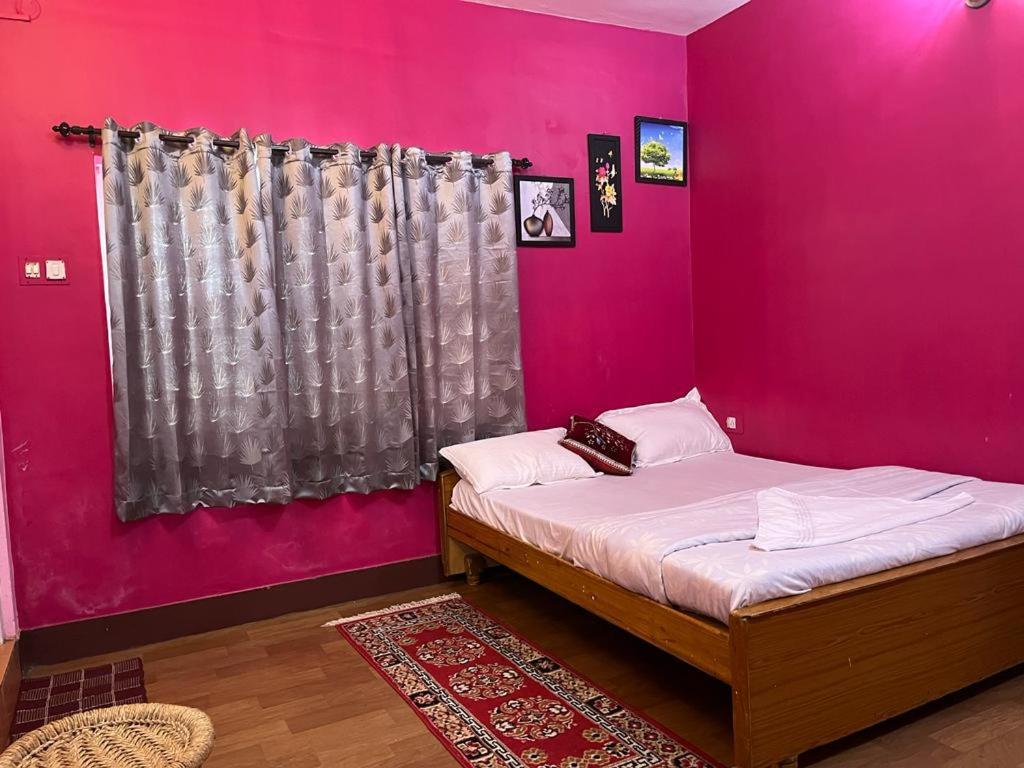 En eller flere senge i et værelse på Winterfell Park