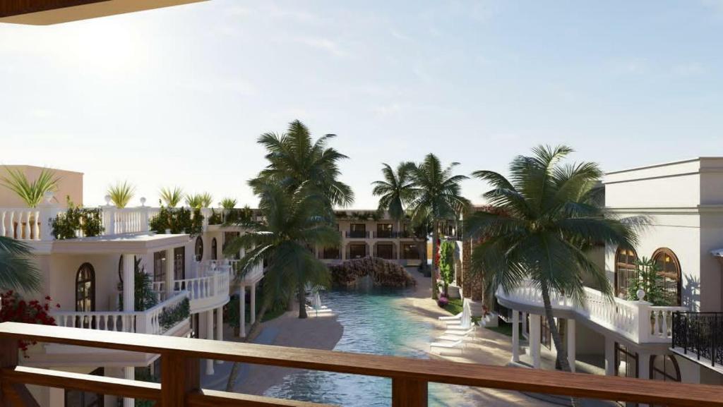 arial view of a resort with palm trees and a pool at Luxury resort in Jericoacoara