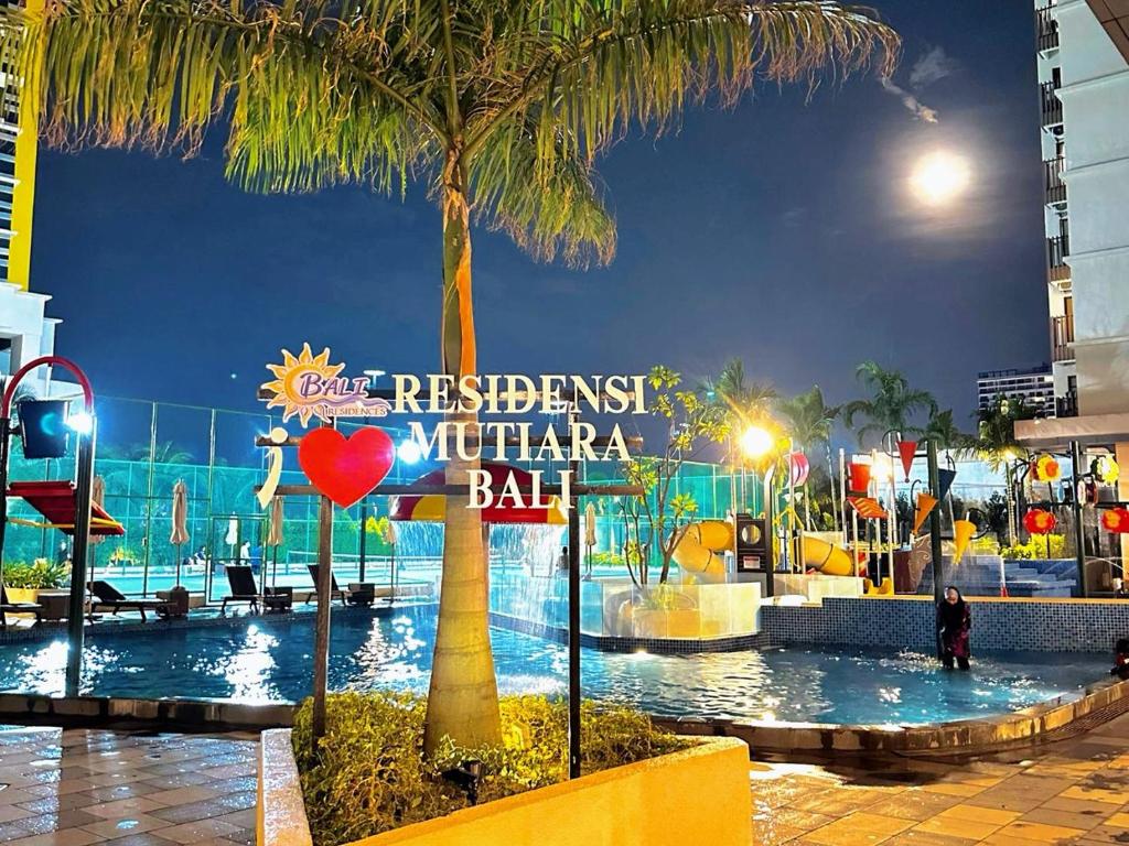 a water park with a sign that reads restricted in marina ball at Bali Residence by D'RZ Muslim Seaview Homestay in Melaka
