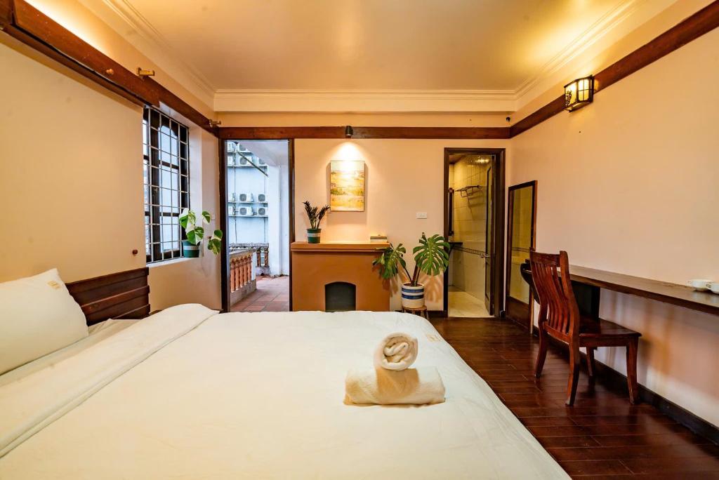 Giường trong phòng chung tại Signature by D Home Sapa