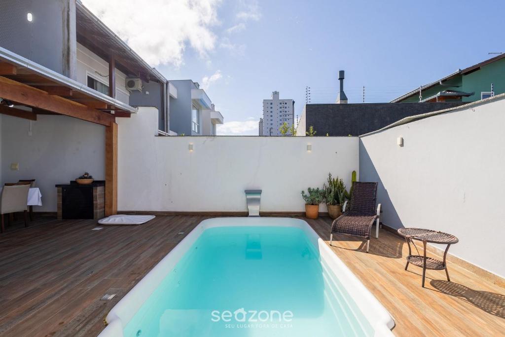 Πισίνα στο ή κοντά στο Casa c/ Piscina e Churrasqueira EKD0397