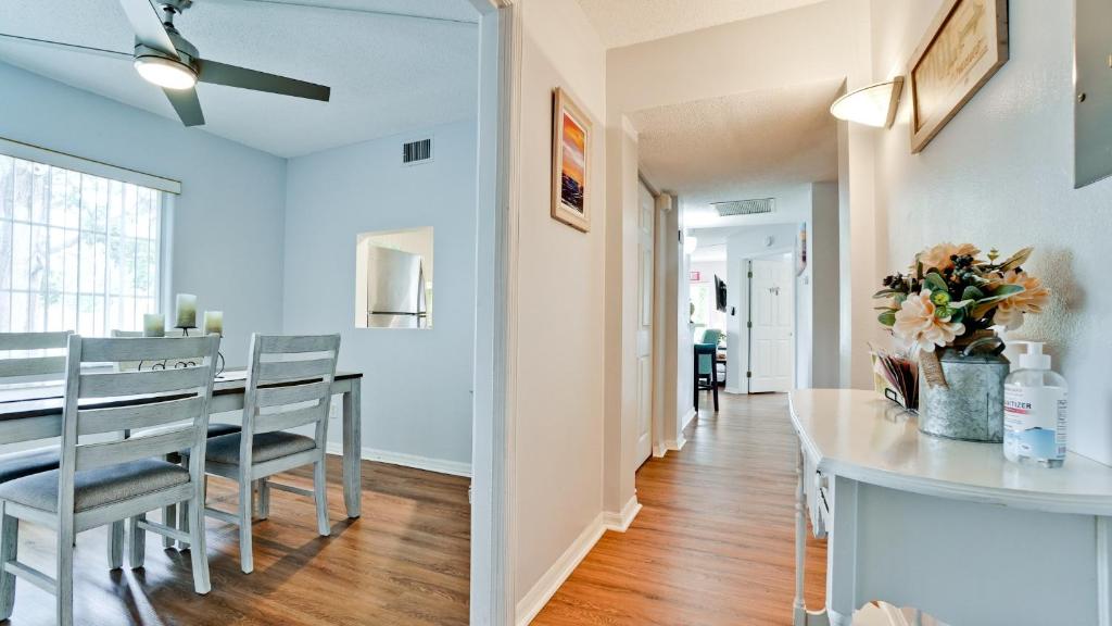 a dining room and kitchen with a table and chairs at Very Close To IMG Academy, Beaches, Restaurants in Bradenton