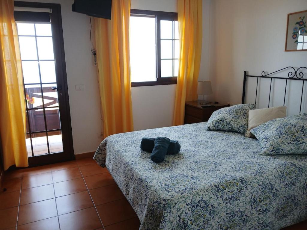 Postel nebo postele na pokoji v ubytování Casa Bonaire, Santa Cruz de La Palma