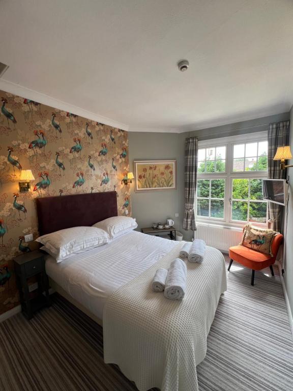 Ένα ή περισσότερα κρεβάτια σε δωμάτιο στο The Ardingly Inn