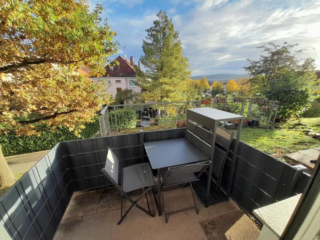 a patio with a table and a grill at Casa Ludi Pforzheim Eutingen gute Wohngegend direkte Buchung möglich keine Freigabe erforderlich inklusive Balkon Terrasse und Tiefgaragenparkplatz im Haus in Eutingen