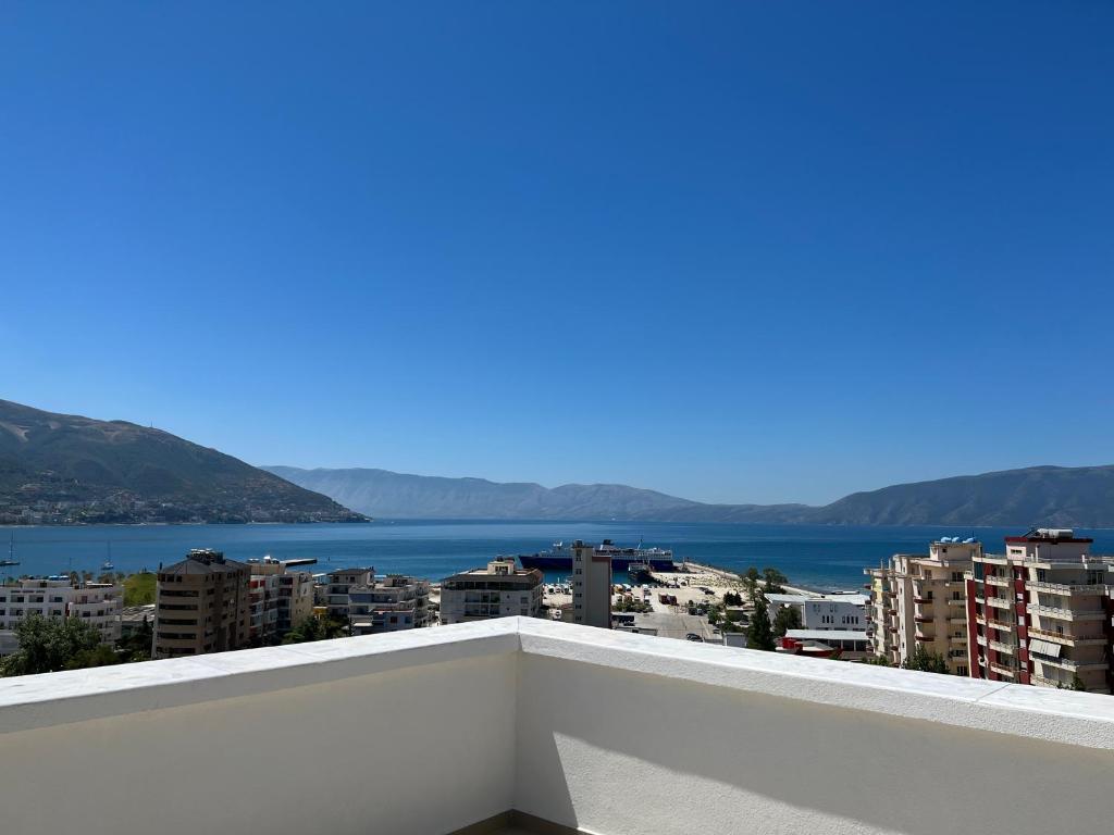 a view of the water from a balcony at Il tramonto in Vlorë