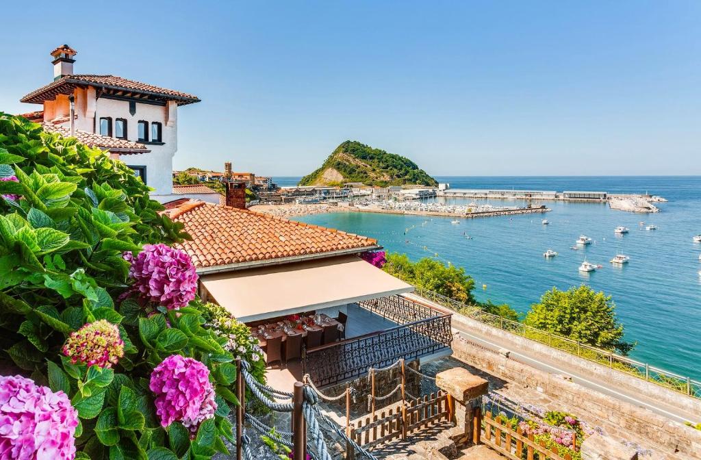 a view of a harbor with boats in the water at VILLA EMBIL GETARIA in Getaria