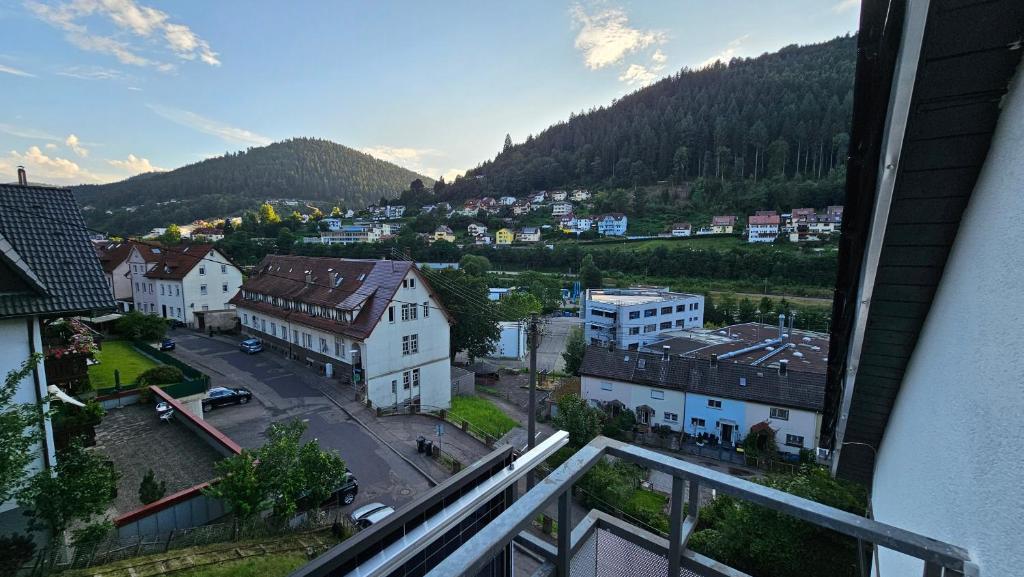 a view from a balcony of a town with a mountain at WiLDBED DE in Bad Wildbad