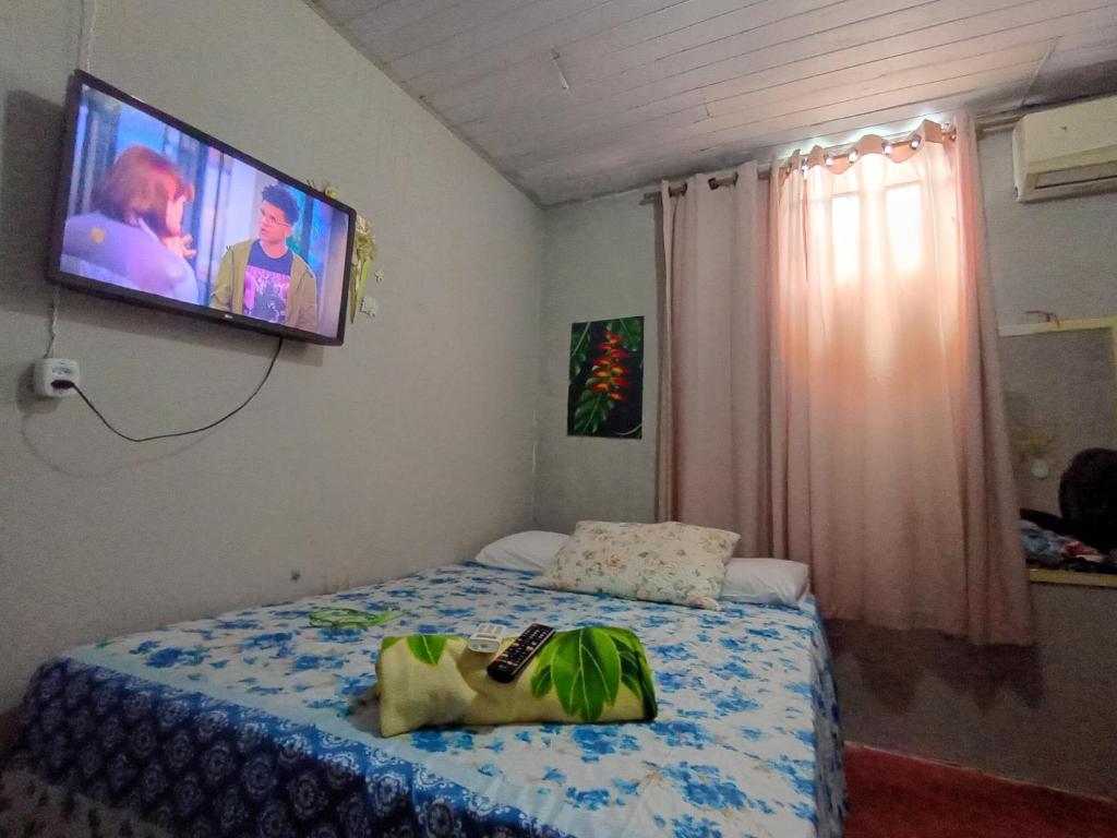 Postel nebo postele na pokoji v ubytování Pousada kurasi alter