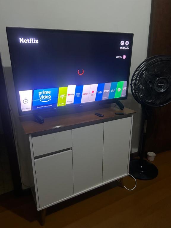 TV o dispositivi per l'intrattenimento presso Casa 5 quartos entre Centro e Pampulha