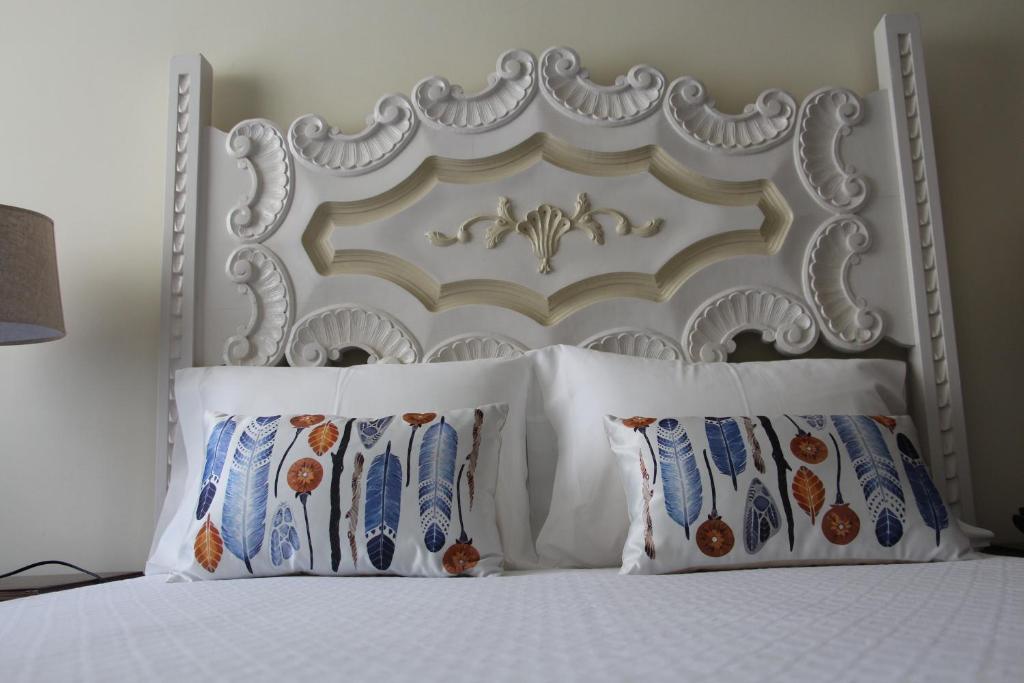 Postel nebo postele na pokoji v ubytování Hotel Vila Esteves