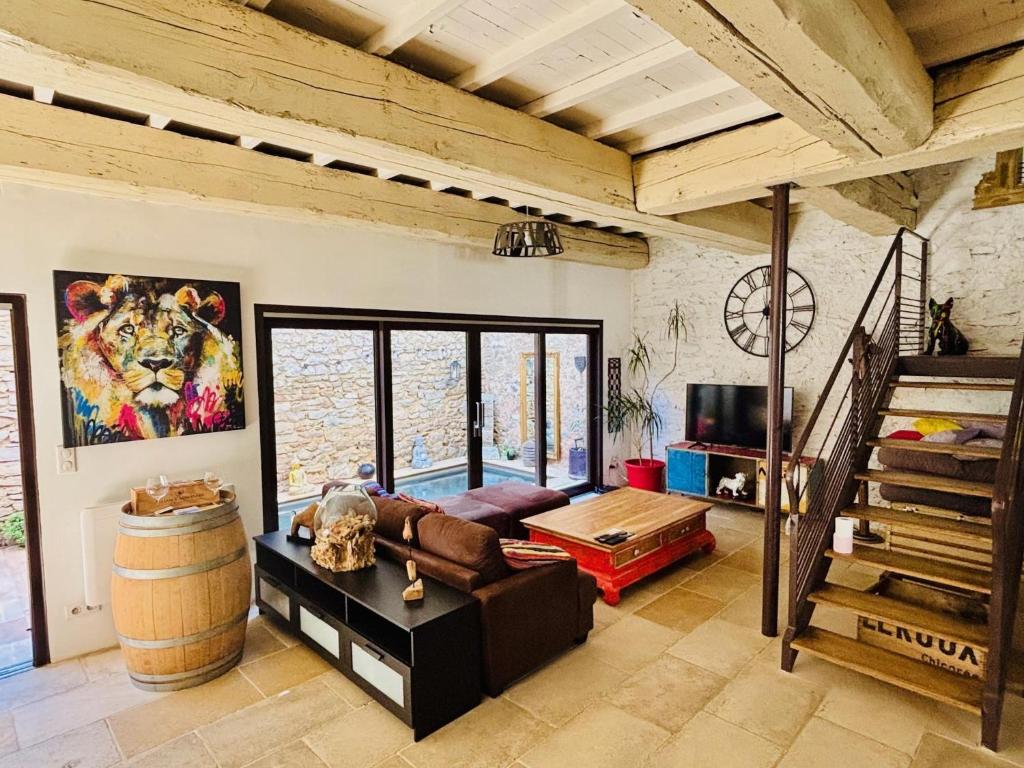Ένα ή περισσότερα κρεβάτια σε δωμάτιο στο Olonzac Escape Pool & Charm