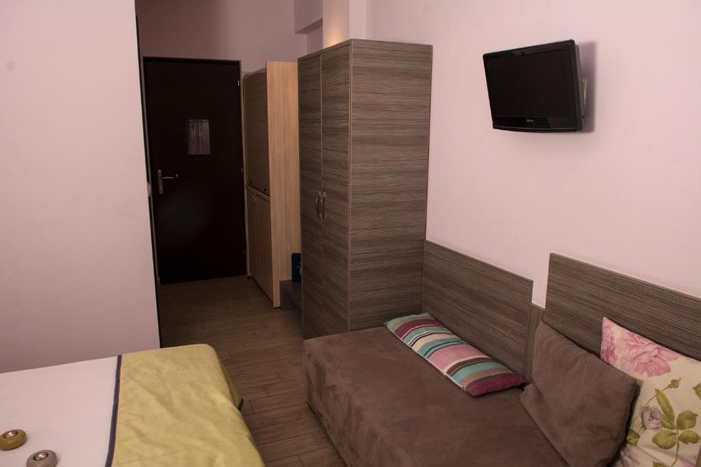 TV a/nebo společenská místnost v ubytování Hotel Olympos