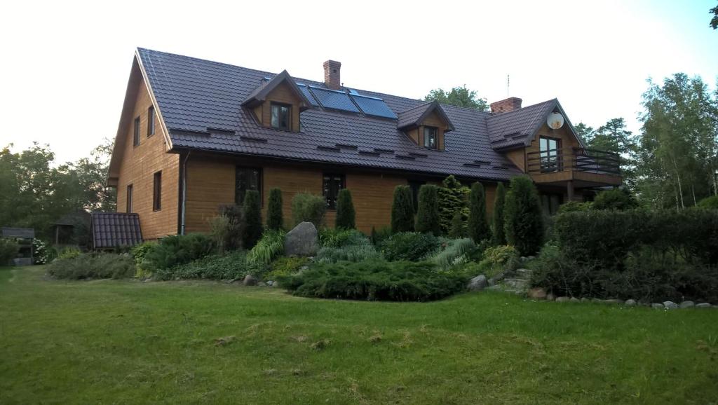 Vonkajšia záhrada v ubytovaní Dom Gościnny Woleninowo