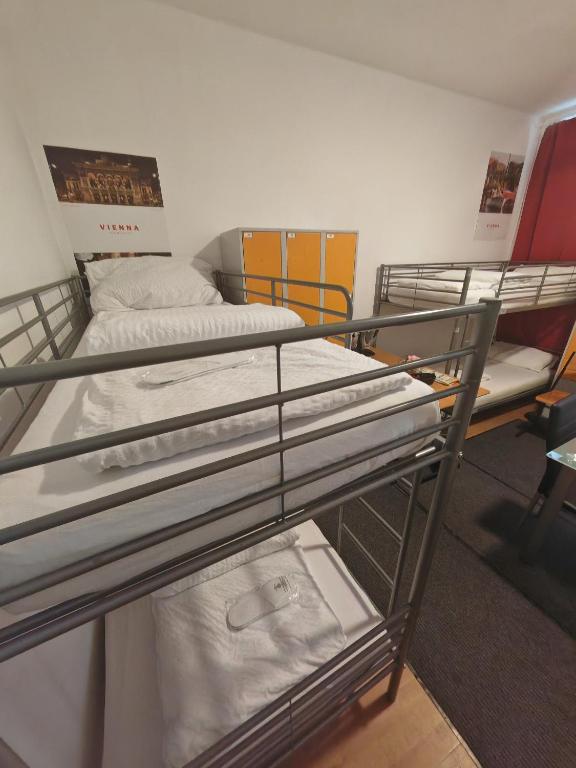 Postel nebo postele na pokoji v ubytování ABAI Dormitory