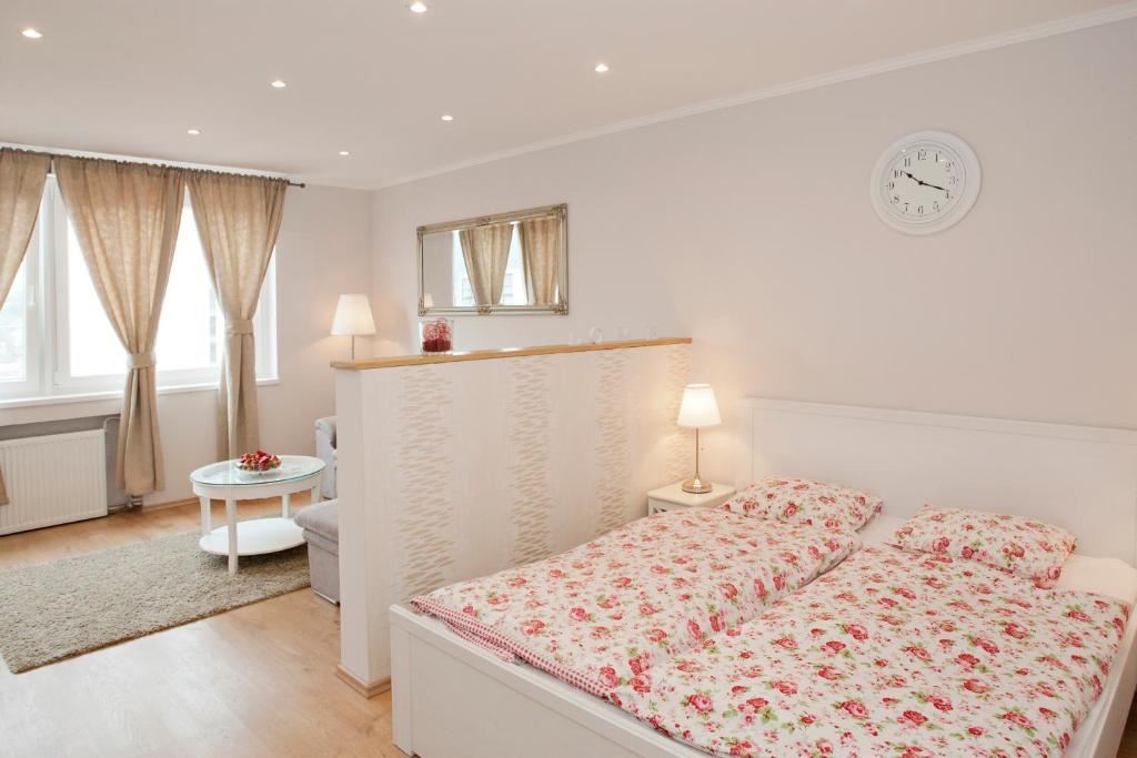 Posteľ alebo postele v izbe v ubytovaní Aurora Apartment Danube View
