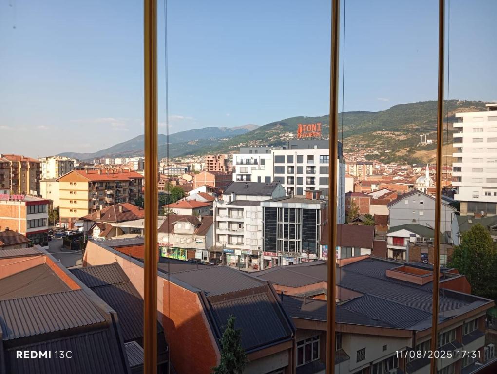 a view of a city with buildings at Bus Station Flat 32 in Prizren