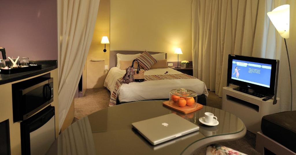 Postel nebo postele na pokoji v ubytování Novotel Marrakech Hivernage