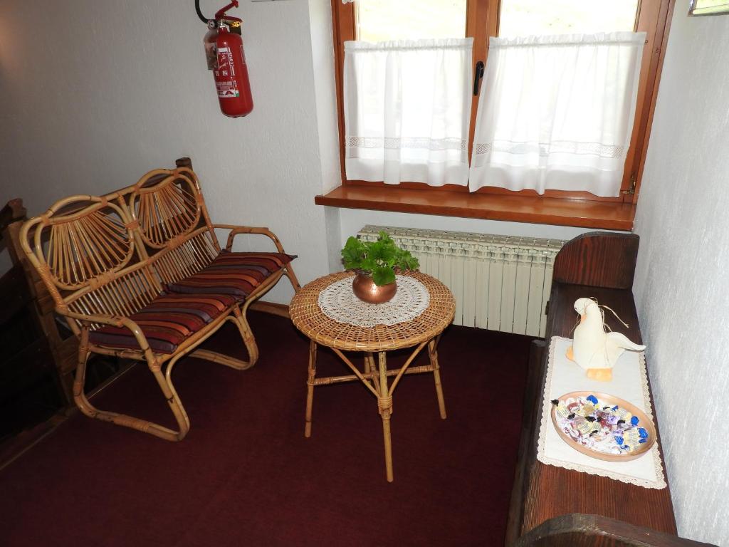 Posezení v ubytování Hotel Le Clocher